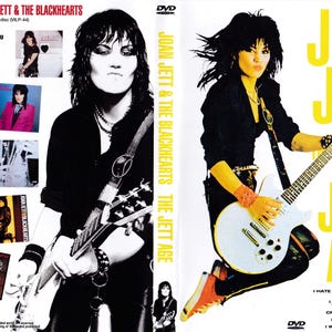 May include: DVD cover for "The Jett Age" featuring Joan Jett & The Blackhearts. The cover has a black and white image of Joan Jett on the left and a color image of her playing a white guitar on the right. The DVD case has a yellow and black color scheme.