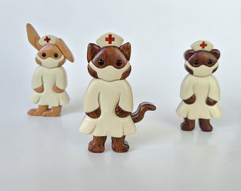 Nurse animal Christmas ornament or magnet, Handmade cat, bunny, & bear intarsia wood art, Personalized wood carving, Wooden decoration