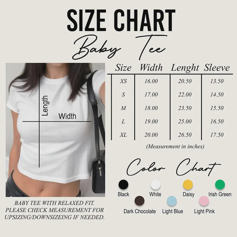 Op de afbeelding: Een witte baby-tee met een relaxte pasvorm, getoond met een maattabel. De tabel geeft de afmetingen in inches voor de maten XS tot XL, inclusief breedte, lengte en mouwlengte. Een kleurenkaart toont de beschikbare kleuren.