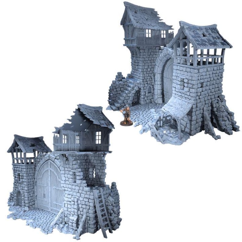 Puede incluir: Dos modelos de puertas de castillo de piedra gris con tejados desgastados y puertas arqueadas. Un modelo tiene una escalera de madera y una peque&ntilde;a figura. Las estructuras est&aacute;n dise&ntilde;adas para juegos de mesa o exhibiciones en miniatura.
