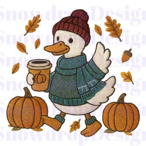 May include: An embroidered design of a duck wearing a burgundy knit cap, teal sweater, and scarf, holding a pumpkin spice latte. Two orange pumpkins and autumn leaves surround the duck, creating a fall theme.