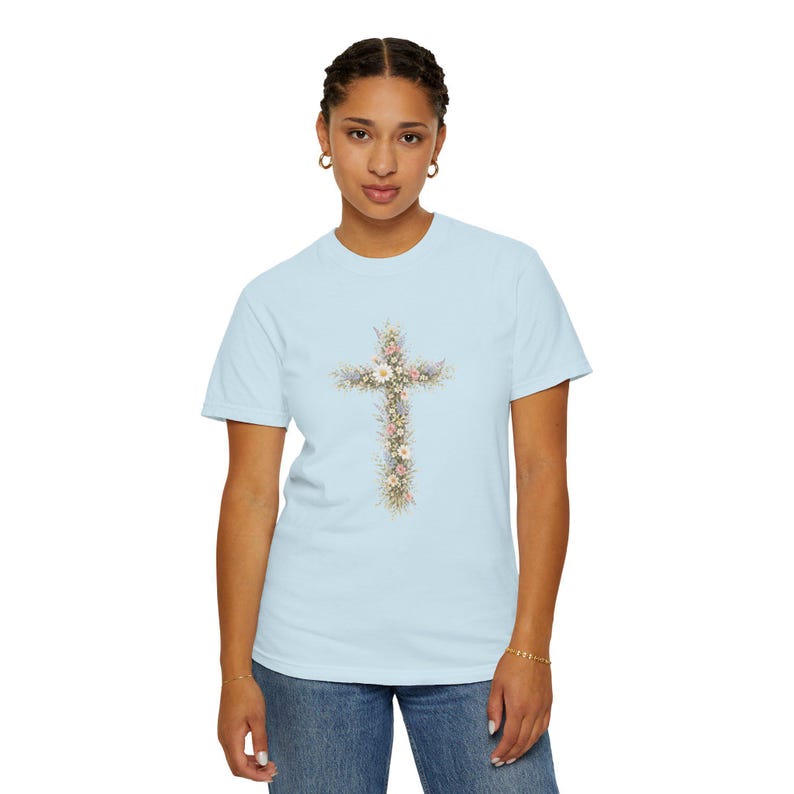 Comfort Colors floral cross shirt featuring a vertical cross of daisies and greenery.