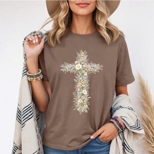 Comfort Colors floral cross shirt featuring a vertical cross of daisies and greenery.