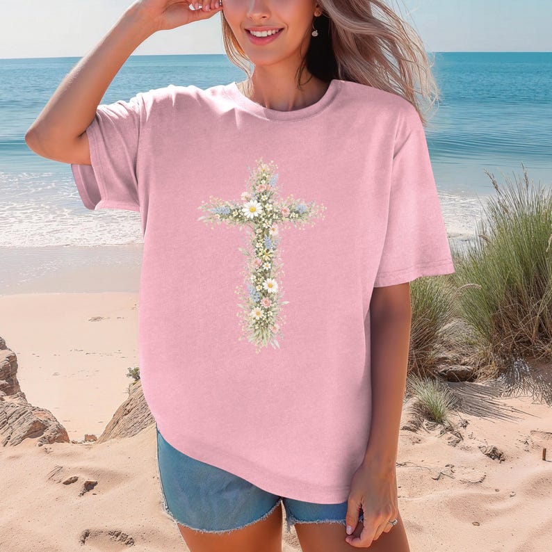 Comfort Colors floral cross shirt featuring a vertical cross of daisies and greenery.