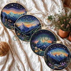 May include: Four circular embroidery hoops displaying mountain landscape designs. Each hoop presents a different night sky scene with mountains, trees, and flowers. The colour palettes include blues, purples, oranges, and greens, creating a serene and artistic aesthetic.