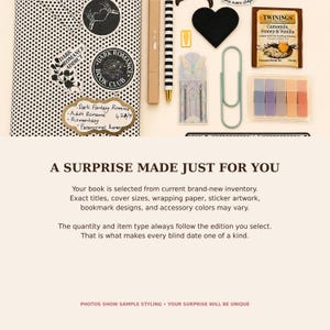 May include: A black and white polka dot book cover with stickers, a tan pen, a striped pen, a black heart, a Twinings tea bag, a butterfly bookmark, a large paperclip, and a set of colorful sticky notes with text A SURPRISE MADE JUST FOR YOU.