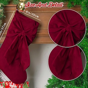May include: A deep red velvet Christmas stocking featuring a large decorative bow on the front. The stocking measures 20 cm wide, 37 cm in total height, and 25 cm at the foot. Two circular insets show close-up details of the fabric texture and bow.