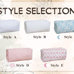 May include: A collection of five rectangular zippered pouches labeled Style Selection. Style A is white striped, Style B is white waffle-textured, Style C is blue floral, Style D is pink waffle-textured, and Style E is white with pink floral and ribbon patterns.