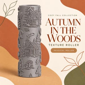 May include: A cylindrical gray texture roller featuring embossed designs of log cabins, pine trees, mushrooms, and lanterns. The text on the right reads COZY FALL COLLECTION AUTUMN IN THE WOODS TEXTURE ROLLER PHYSICAL ROLLER in brown and black lettering.