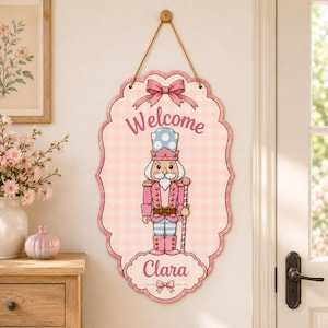 Personalisiertes Nussknacker-Weihnachtstürschild, Willkommensschild mit individuellem Namen, rosa Weihnachtstürdekoration, festliches Nussknacker-Schild