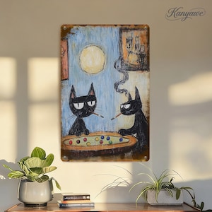 May include: A metal sign with an illustration of two black cats playing pool, each smoking a cigarette. The background features a full moon and a blue sky. The sign has a distressed, vintage appearance.
