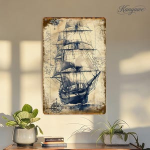 May include: A vintage-style metal sign featuring a detailed illustration of a tall sailing ship on a nautical map background. The sign has a distressed, aged appearance with compass rose details and the word "Kanyawe" in the upper right corner.