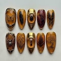 Handmade Amber Brown Press On Nails | Gothic Insect Butterfly Spider Web Gold Frame Nail Art | Almond Nails for Witchy Gothic Style product logo