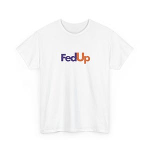 May include: White t-shirt with the text "FedUp" in a logo style, using purple and orange colors. The shirt is a casual wear item, suitable for everyday use.