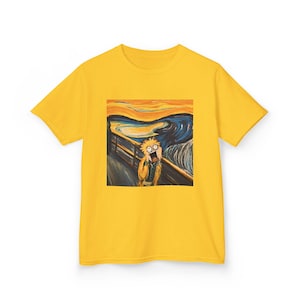 May include: Mustard yellow t-shirt with a parody of Edvard Munch's "The Scream" painting. The artwork shows a cartoon character in the style of the original painting, with a shocked expression. The shirt is made of a soft, comfortable material.