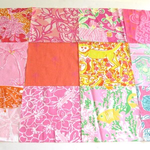 May include: A patchwork quilt top composed of twelve square fabric panels featuring various vibrant patterns in shades of pink, orange, yellow, and teal. The designs include floral motifs, tropical palm trees, monkeys, fish, and seashells.