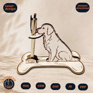 May include: A laser-cut wooden pen holder featuring a dog sitting on a bone-shaped base. The dog holds a metallic pen in its mouth. A small food bowl graphic with the name Luna is positioned at the base of the pen. The design includes file format labels.