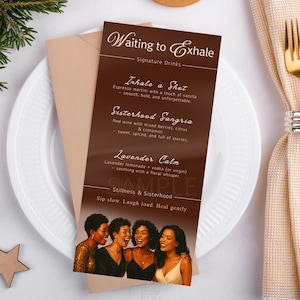 May include: A brown menu card with the text "Waiting to Exhale" and signature drinks. The menu includes "Inhale a Shot", "Sisterhood Sangria", and "Lavender Calm". The menu is on a white plate with a napkin, fork, and knife.