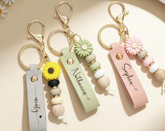 Porte-clés personnalisé marguerite en perles pour fille : porte-clés en cuir, cadeaux de demoiselle d'honneur, cadeau de fille de fleur, cadeau de fête des mères, cadeau d'anniversaire