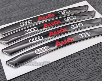 Pegatinas para llantas de Audi: emblema de anillos negros (4 unidades, 7 x 90 mm)