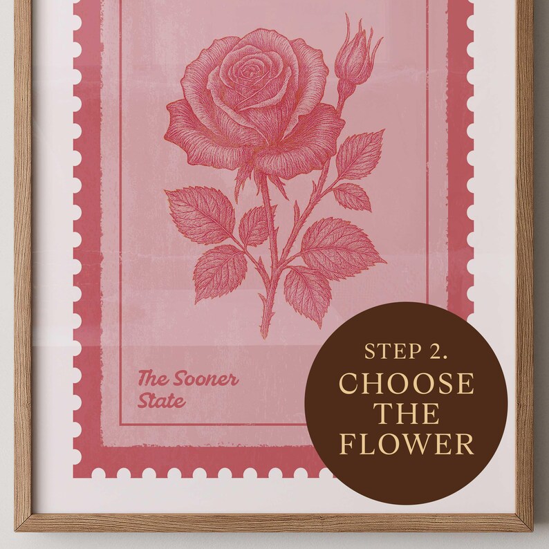 May include: A framed print featuring a detailed illustration of a pink rose with a bud and leaves. The artwork is set against a pink background with a postage stamp design. Text includes "The Sooner State" and "Step 2. Choose the Flower."