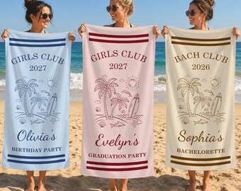 May include: Three rectangular beach towels in light blue, light pink, and cream. Each towel features a tropical beach graphic with palm trees, a surfboard, and a sun, along with custom text including names, years, and event titles like Girls Club.