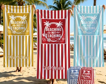May include: Three rectangular beach towels in yellow, red, and light blue with white vertical stripes. Each towel features a central graphic of palm trees, seashells, and the text Beaching Not Teaching, with a personalized name printed below.