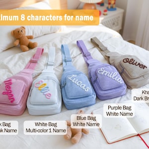May include: A collection of corduroy sling bags in pink, white, blue, purple, and khaki. Each bag features a name embroidered on the front. The image includes text indicating a maximum of 8 characters for the name.