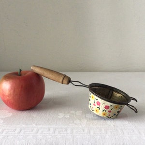 primitive strainer with wooden handle, metal colander kitchen utensil, vintage gadget, hand held Ekco USA sieve screen, floral flower gift