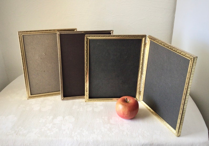 8 x 10 gold metal picture frames, singles and hinged double, vintage MCM stamped tin photo holders Bild 1