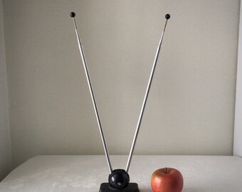 Tv antenna rabbit ears, vintage television receiver, atomic space age decor, midcentury MCM