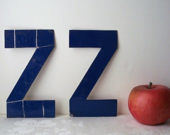 blue metal letter z, aluminum marquee monogram, vintage alphabet sign