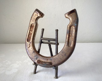 Pitching horse shoe forged steel, throwing game, vintage iron horseshoe