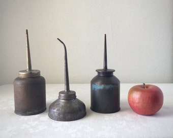 Oil cans, vintage metal thumb dropper, industrial tool art, eagle made, rustic primitive