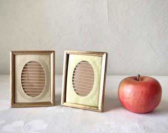 Gold metal picture frames, oval embossed window mat, 3 by 4 photo