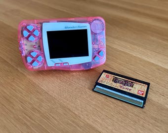 WonderSwan - rosa transparente, pantalla IPS, juego legendario Gunpey GRATIS
