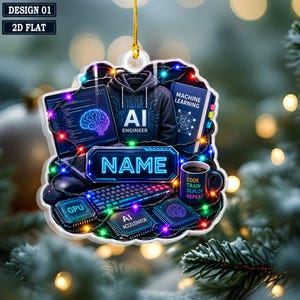 May include: A decorative ornament featuring a computer setup with a laptop displaying a brain graphic, a hoodie labeled AI ENGINEER, a book titled MACHINE LEARNING, a mug with text, and components labeled GPU and AI ACCELERATOR, all wrapped in colorful fairy lights.