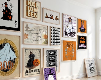 May include: A collection of framed Halloween-themed art prints. The prints feature various spooky designs, including a haunted house, witch hats, ghosts, pumpkins, and the text "Halloween", "Trick or Treat", and "Happy Halloween".