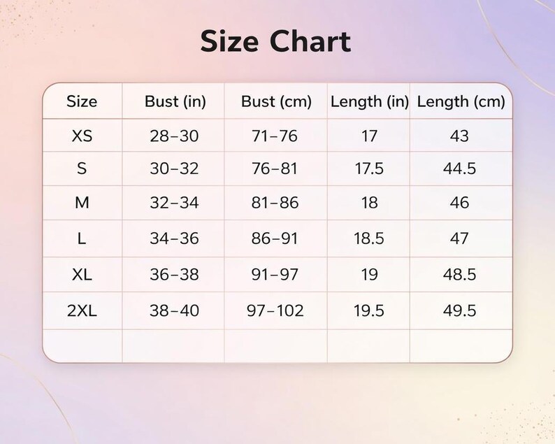 May include: A size chart with measurements in inches and centimetres. The chart includes sizes XS to 2XL, with bust measurements ranging from 28-40 inches (71-102 cm) and lengths from 17-19.5 inches (43-49.5 cm). The text "Size Chart" is at the top.