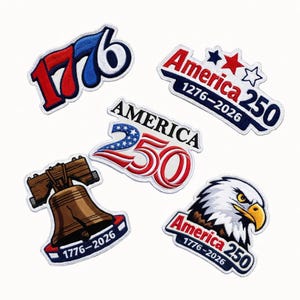 May include: A selection of embroidered patches featuring patriotic designs. The patches display the Liberty Bell, an American eagle, and the numbers "1776" and "250" in red, white, and blue. These patches celebrate the 250th anniversary of the United States.