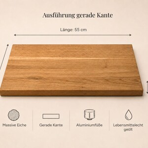 May include: A rectangular solid oak wood board with a straight edge design. The board measures 55 cm in length, 31 cm in width, and 3.5 cm in thickness. Icons indicate solid oak, straight edge, aluminum feet, and food-safe oiled finish.