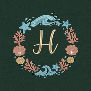 May include: An embroidered design featuring the letter "H" in gold, surrounded by a wreath of ocean elements. The wreath includes blue waves, starfish, coral, seashells, and gold coins, all set against a dark green background.