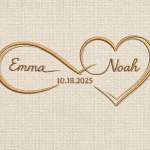 May include: Embroidered design featuring the names "Emma" and "Noah" within an infinity symbol and a heart, with the date "10.18.2025" in a gold color on a beige textured background. Ideal for wedding decor.