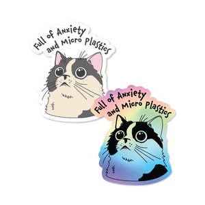 May include: Two cat stickers with the text "Full of Anxiety and Micro Plastics." One sticker features a black and white cat with a beige face, the other a black and white cat with a blue and purple gradient.