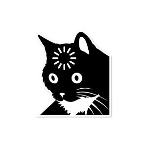 May include: Black and white sticker featuring a cat with a loading symbol on its forehead. The cat has large, round eyes and a white patch on its chest. The sticker is die-cut with a white border.