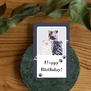 3匹のかわいい犬の誕生日カード