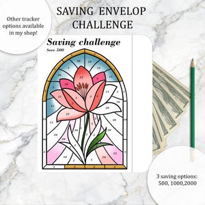 May include: A white saving challenge tracker with a floral design, featuring a pink flower with green leaves. The tracker has the text "Saving challenge" and "Save 500". A green pencil and cash are also visible.