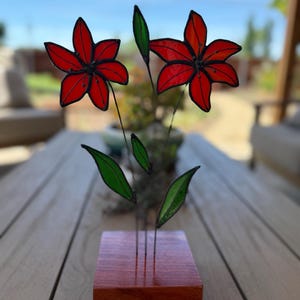 Stained glass orange lily flowers lillies in wood base
