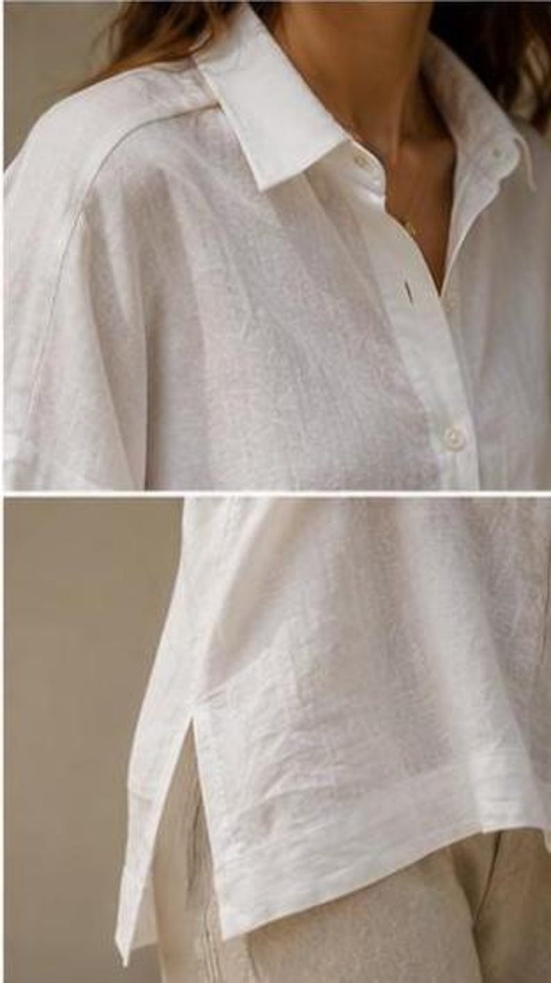 May include: A white button-down shirt with a classic collar, long sleeves, and a visible button placket. The shirt features a textured fabric, a straight hemline, and side slits at the bottom, providing a relaxed fit and a clean, simple design.