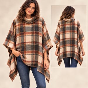 May include: A plaid poncho featuring a cowl neckline and a brown, cream, and charcoal grey checkered pattern. The garment has side buttons and an asymmetrical hemline, shown from both the front and back views, paired with blue denim jeans.